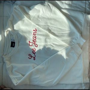 White crewneck with cursive red Lee Jeans embroidery